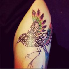 Colorful bird lace tattoo on leg