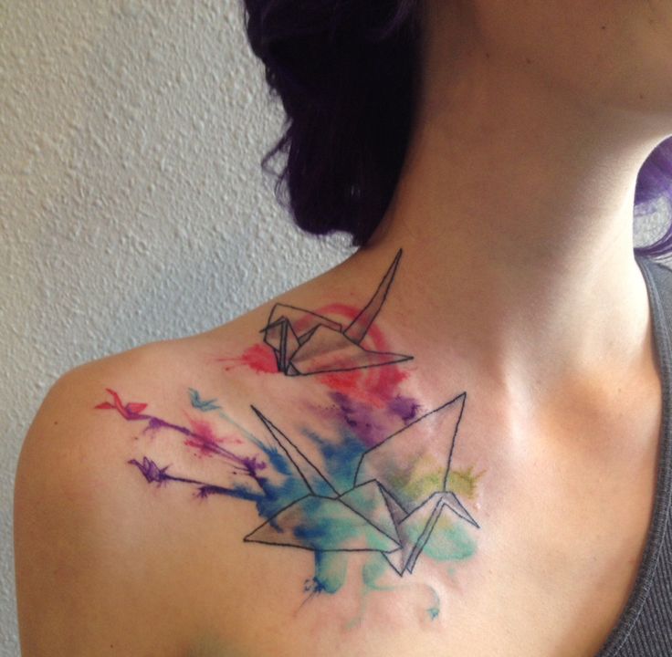 Colorful black origami tattoo on shoulder