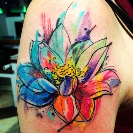 Colorful flower tattoo on hand