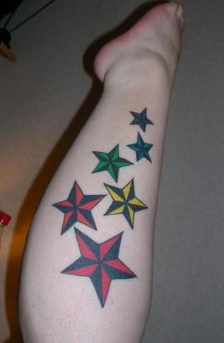 Colorful flowers star tattoo on arm