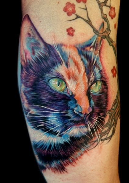Colorful lovely cat tattoo on leg