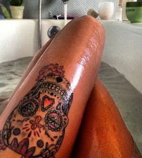 Colorful women skull tattoo on leg