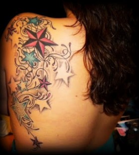 Colorful women stars tattoo on shoulder