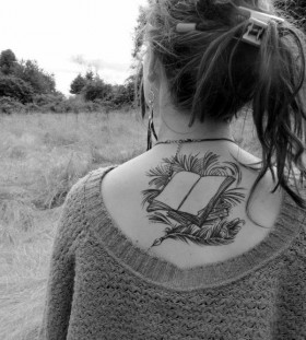 Cool, simple back book tattoo