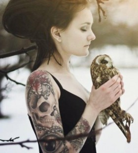 Cool woman skull tattoo on arm