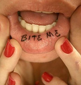 Crazy bite me lips tattoo