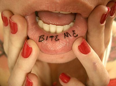 Crazy bite me lips tattoo