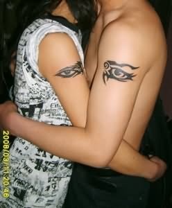 Crazy couple eye tattoo on arm