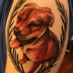 Crazy funyy dog tattoo on arm