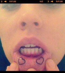 Crazy hearts lips tattoos
