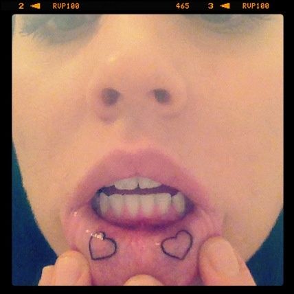 Crazy hearts lips tattoos