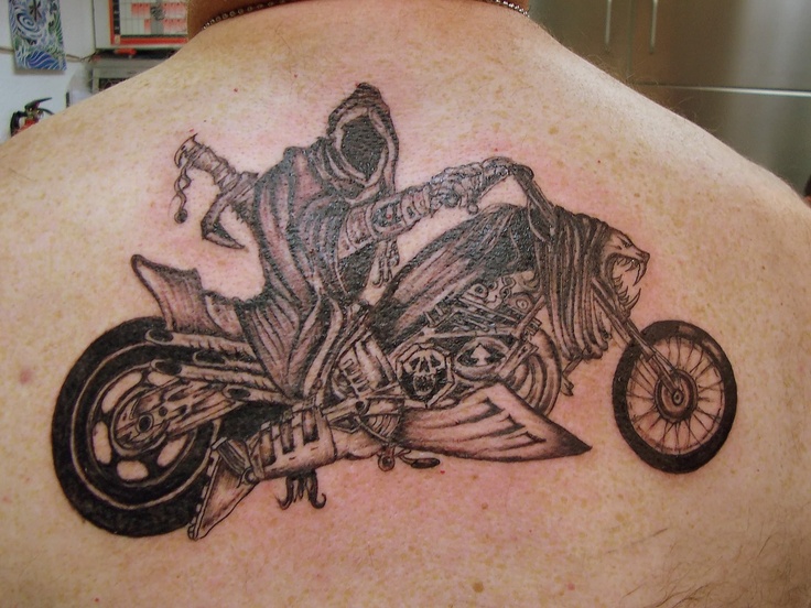 Crule black bicycle tattoo on back