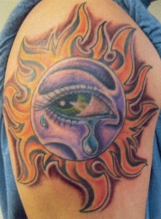 Crying colorful eye tattoo on shoulder