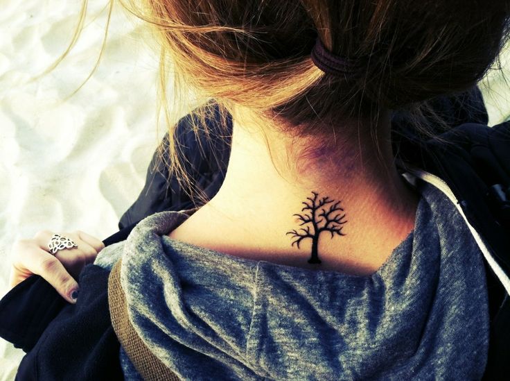 Cute black tree tattoo on shoulder