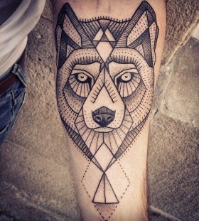 Cute black wolf tattoo on arm