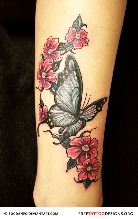 Cute butterfly and flower tattoo on hand