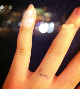 Cute finger love tattoo on arm