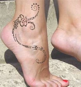 Cute flowers and line tattoo on leg