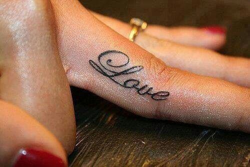 Cute love quote tattoo on finger