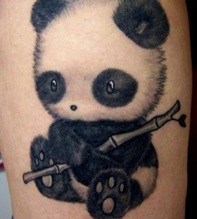 Cute pand tattoo on leg