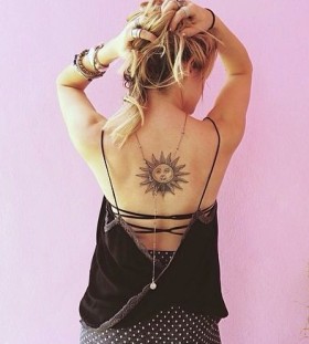 Cute simple back sun tattoo