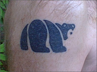 Cute simple bear tattoo on shoulder