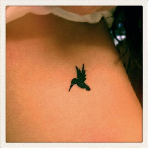 Cute small bird tattoo