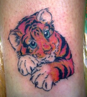 Cute small tiger tattoo on leg
