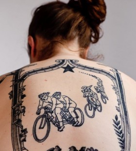 Cute women's bicycle tattoo on back