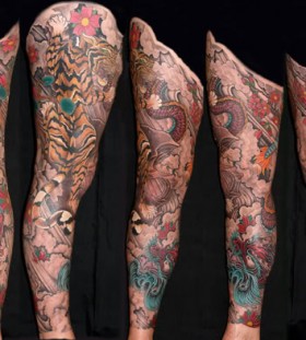 Dragon and amaizing tiger tattoo on leg