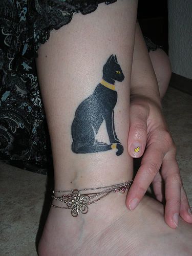 Egypt style cat tattoo on leg