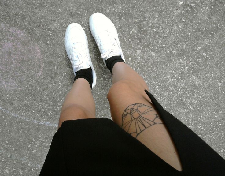 Egypt style girl’s origami tattoo on leg