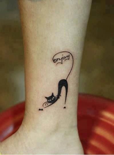 Enjoy pretty cat tattoo on leg