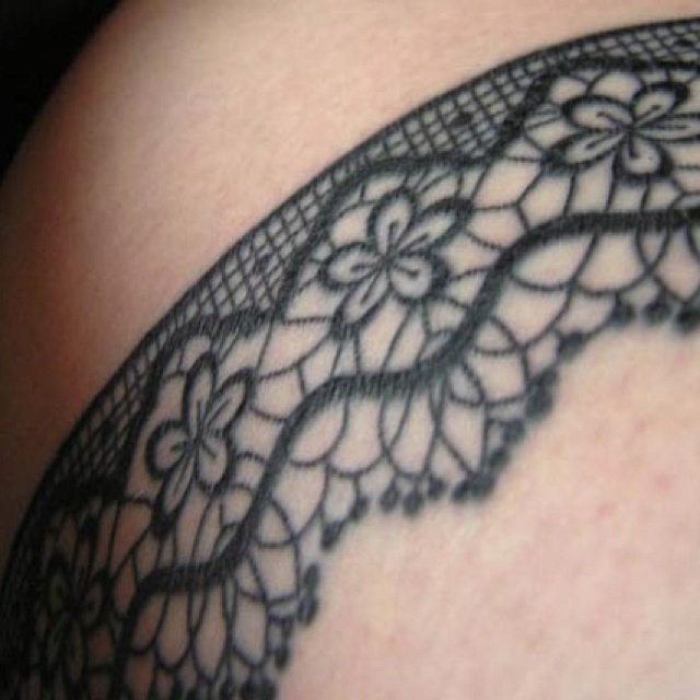 Flowers and cute lace tattoo on arm