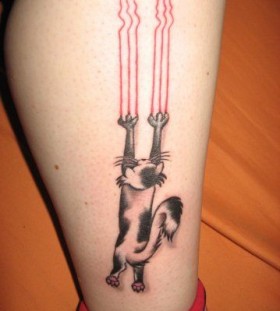 Funny black and white cat tattoo on leg