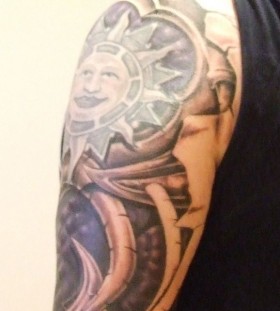Funny black sun tattoo on arm