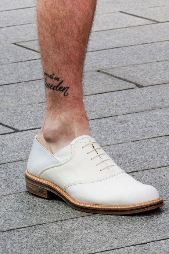 Funny men’s quote tattoo on leg