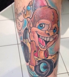Funny monkey and car tattoo on leg