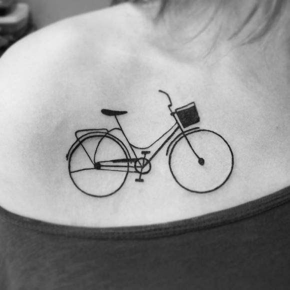 Girl bicycle tattoo