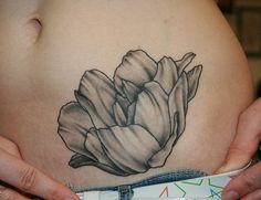 Girl with tulip tattoo