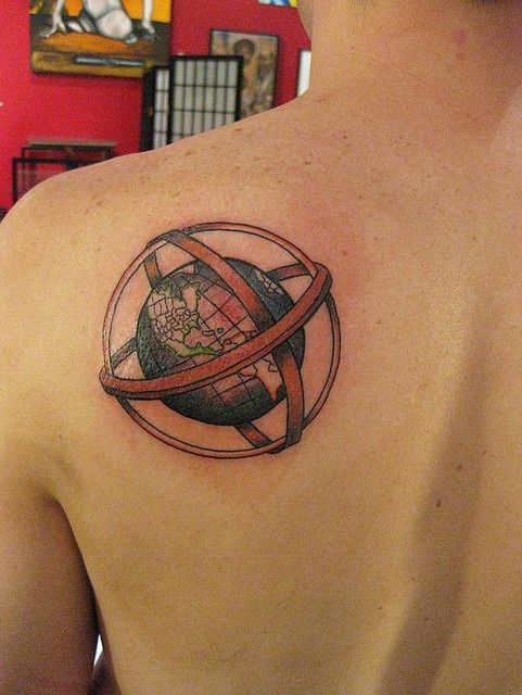 Globe tattoo on chest