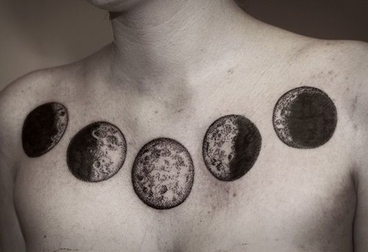 Gorgeous black moon tattoo on shoulder
