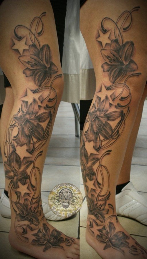 Gorgeous flower star tattoo on arm