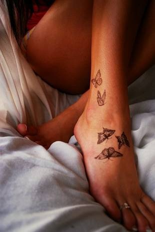Gorgeous girl butterfly tattoo on leg