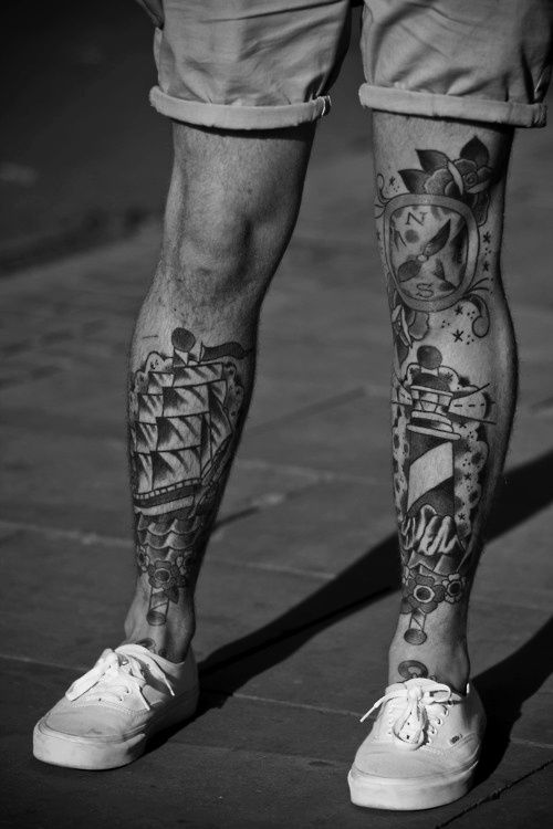 Gorgeous men’s ship tattoo on leg