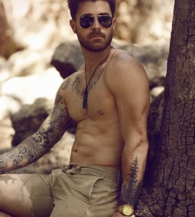 Gorgeous men's tree tattoo on arm