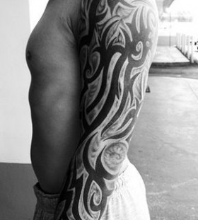 Gorgeous simple tribal tattoo on arm