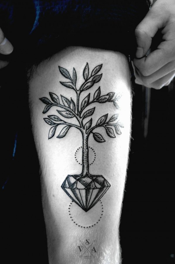 Gorgeous tree crystal tattoo on leg