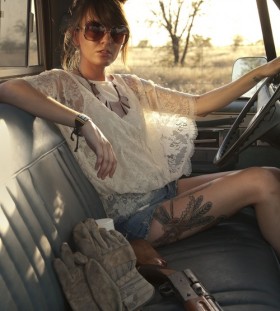 Gorgeous women's lace tattoo on leg