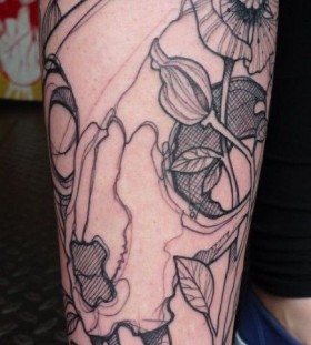 Great black poppy tattoo on leg